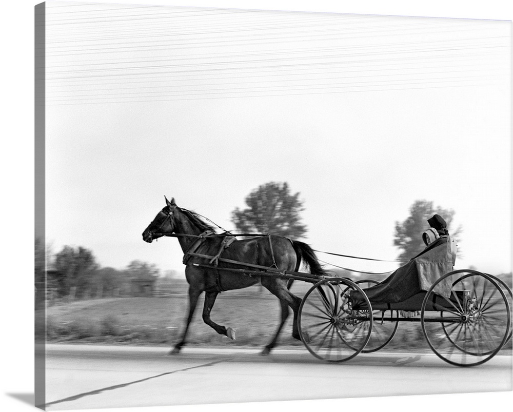 1930s Amish Woman And Child Riding In Horse Drawn Wagon Lancaster County Pennsylvania USA.