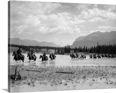 1930s Men Riding Horses Through River, House River, Alberta, Canada