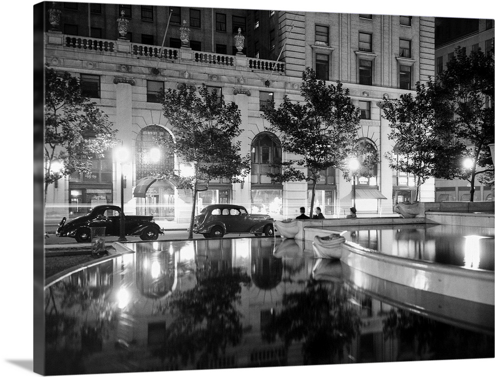 1930's Night Scene 5th Avenue Tree Lined Sidewalk Cars Anonymous Silhouetted Men Reflecting Water In Pulitzer Fountain NYc...