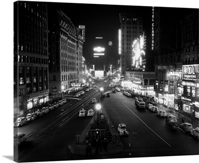 1930's Overhead Of Times Square Lit Up At Night With Cars Lining Curbs NYC NY USA