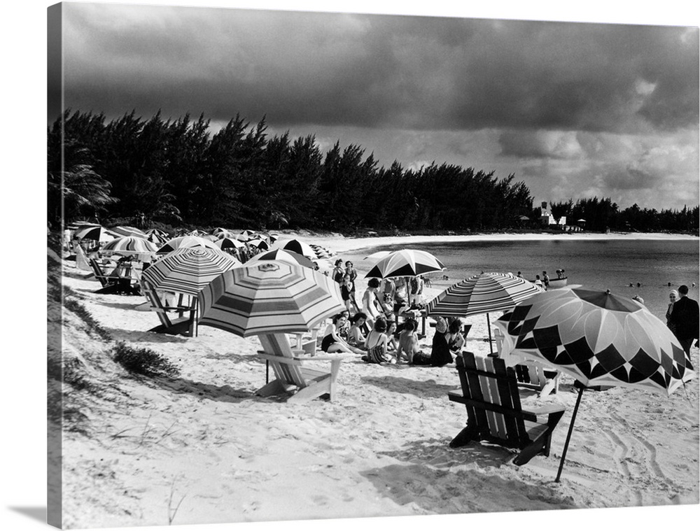 1940's Beach Umbrellas Chairs On Sand Paradise Beach Nassau West Indies.