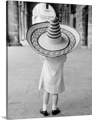 1950's 1960's Small Girl Tourist Seen From Behind Wearing Oversized Too Big Straw Hat
