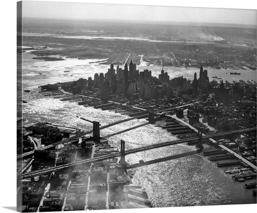 1950's Aerial Downtown Manhattan East And Hudson Rivers Meet In Harbor Brooklyn And Manhattan Bridges.