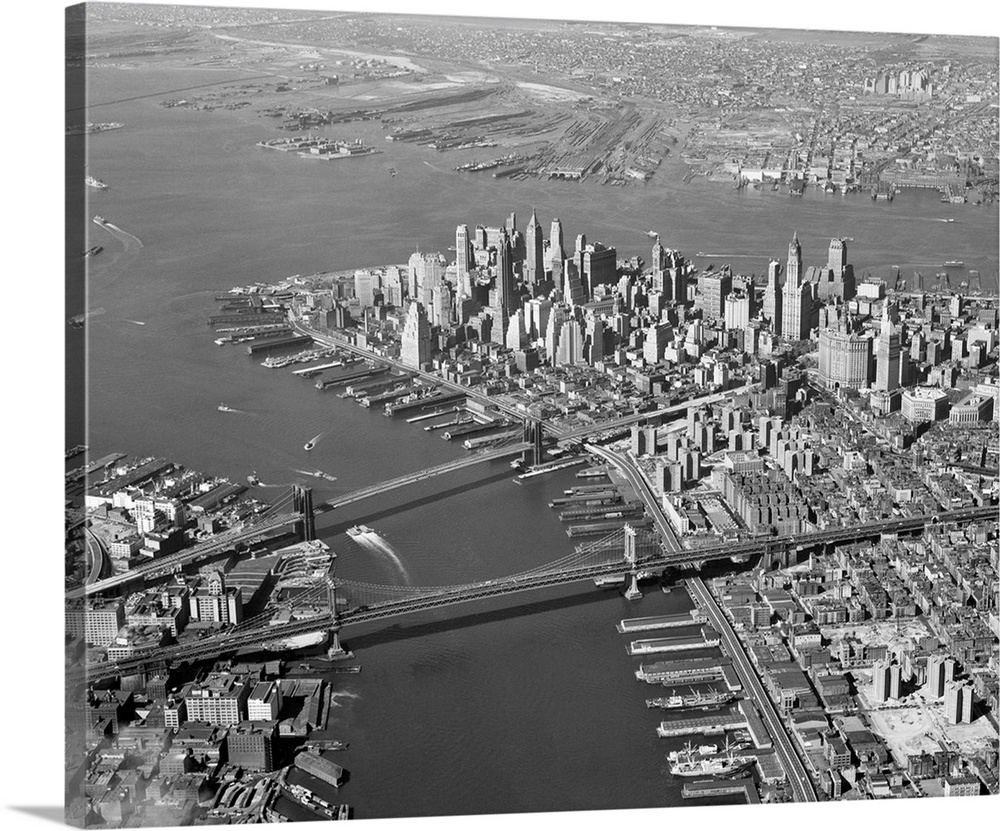 1950's Aerial Of Downtown Manhattan East And Hudson Rivers Meet In Harbor Brooklyn And Manhattan Bridges.