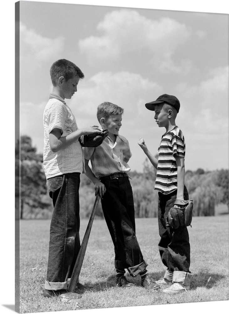 1950s Boys Baseball Threesome One Holding Bat Others Wearing Mitts Having Discussion.