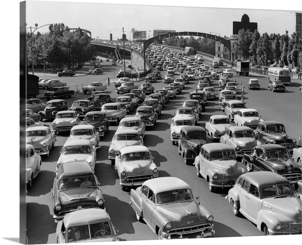 1950's Heavy Traffic Coming Off Of The Ben Franklin Bridge Driving From Camden Nj Into Philadelphia Pa USA.