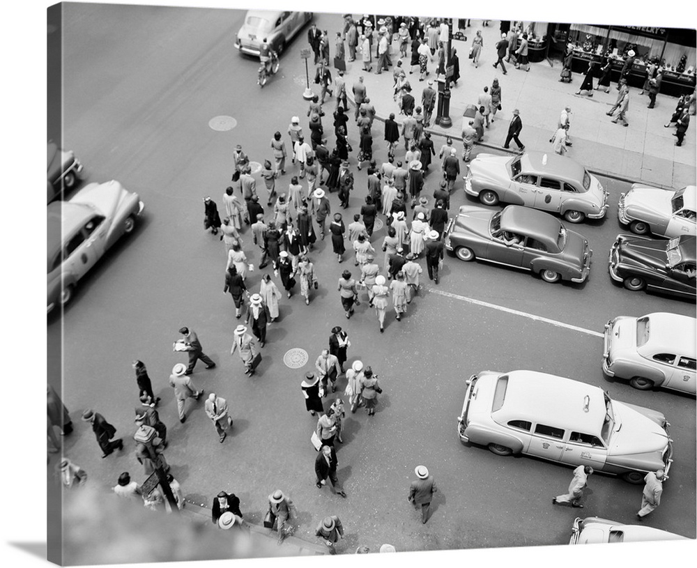 1950's New York City, NY 5th Avenue Overhead View Of Traffic And Pedestrians Crossing Street Rush Hour.