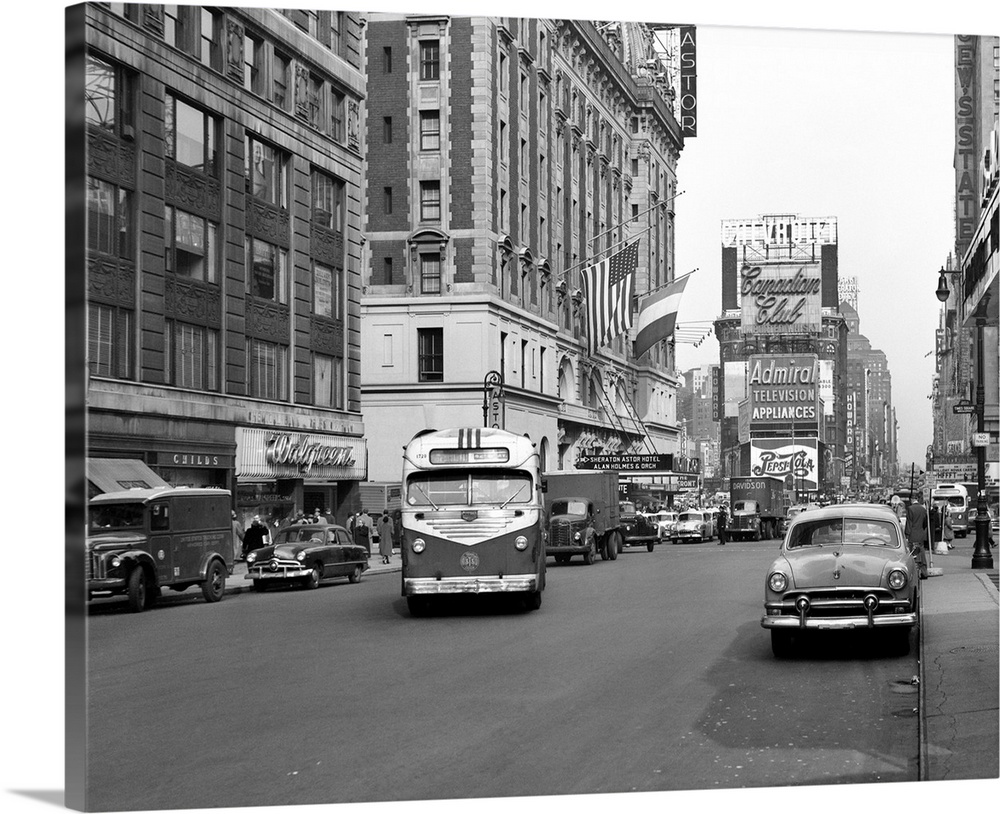1950's New York City Times Square Traffic Broadway Bus Looking North To Duffy Square From West 44th Street NYc NY USA.
