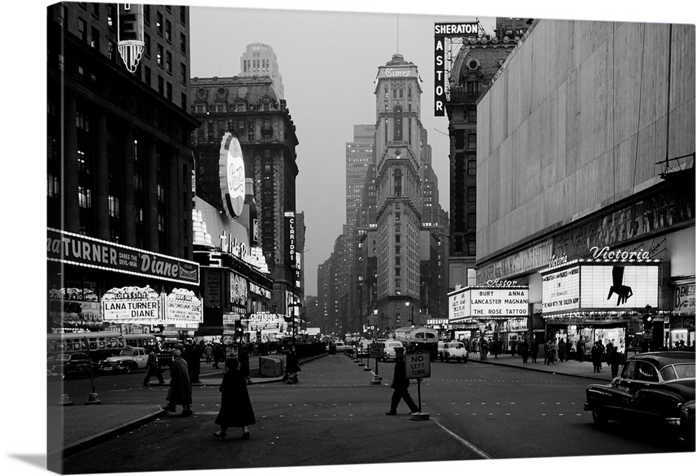 1950's Night Times Square Looking South From Duffy Square To NY Times Building Movie Marquees New York City NY USA.