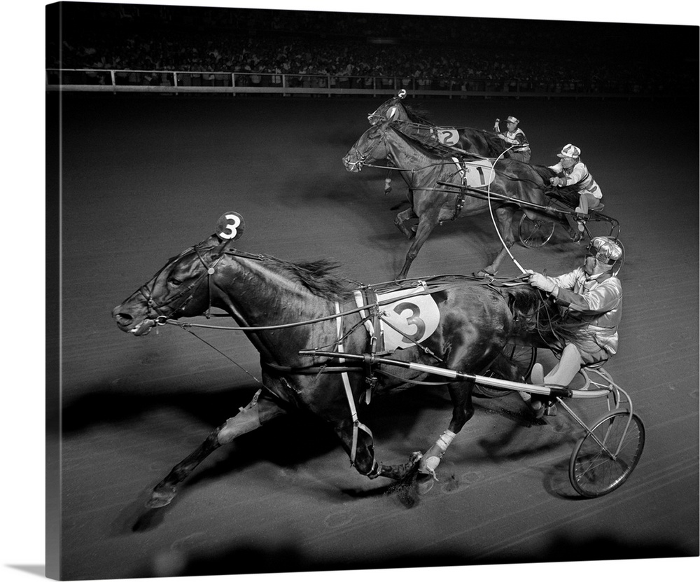 1950s Side View Of 3 Runners In Night-Time Harness Race.