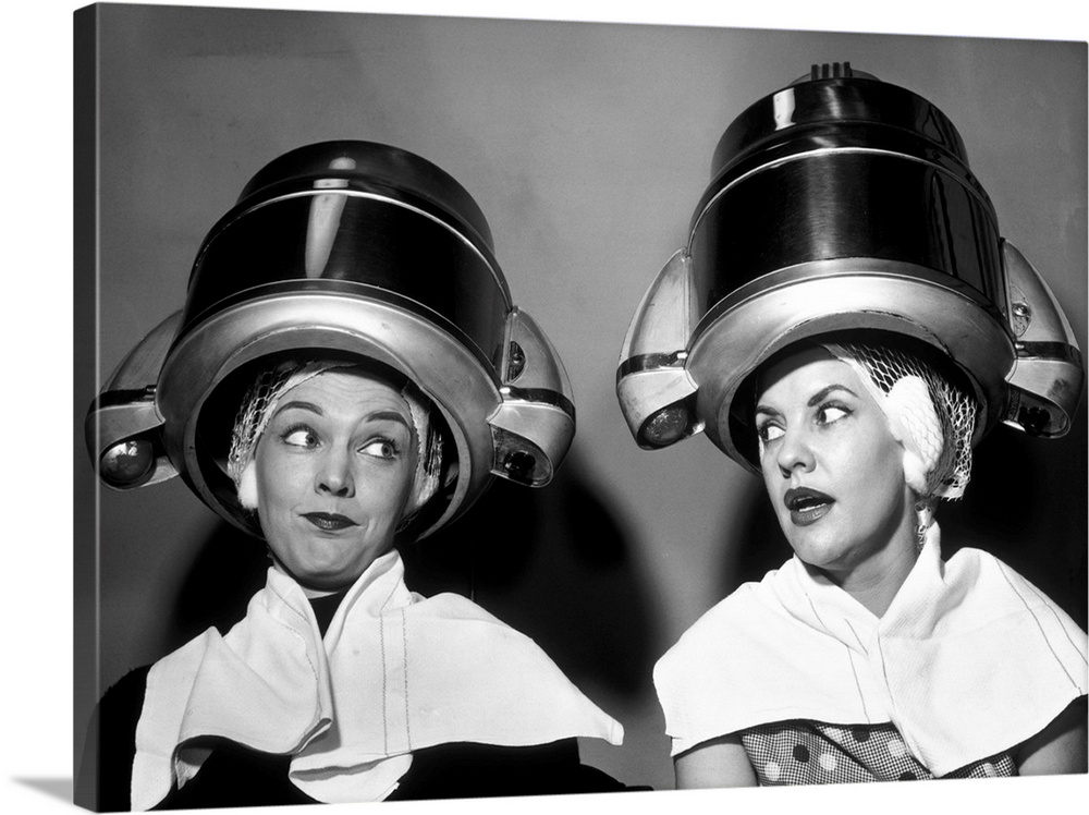 1950s Two Women Sitting Together Gossiping Under Hairdresser Hair Dryer.