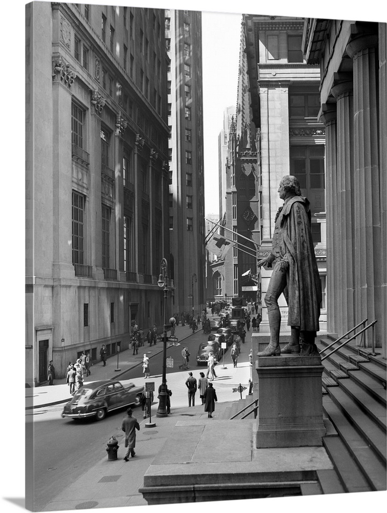 1950's Wall Street From Steps Of Federal Hall National Memorial Looking Towards Trinity Church In New York City USA.
