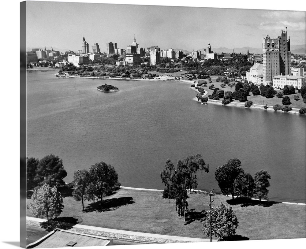 1950's With Lake Merritt In Foreground Skyline View Of Oakland California USA.