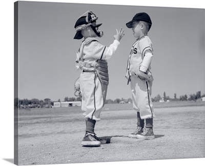 1960s Boy Little Leaguer Pitcher Arguing With Catcher