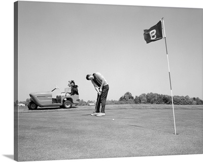 1960's Man Playing Golf