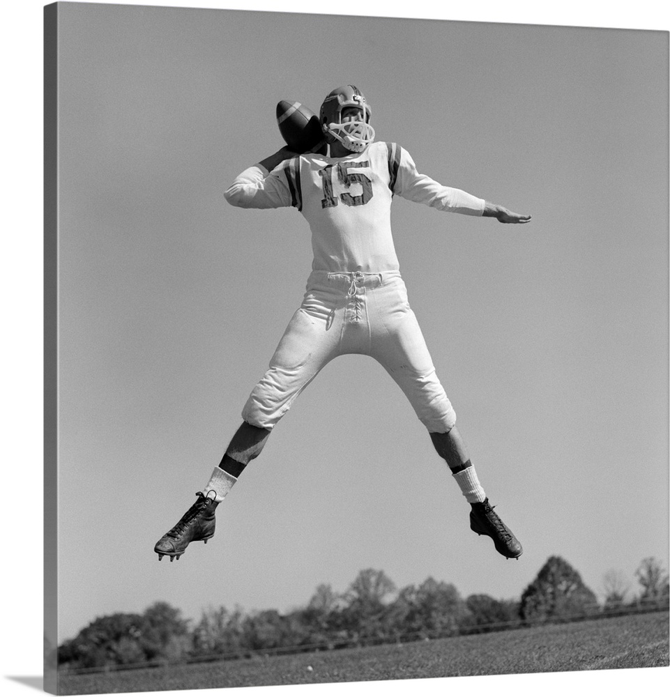 1960's Quarterback Jumping And Throwing Pass