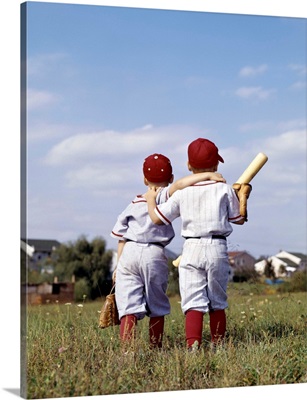 1960s Two Boys Brothers Wearing Little League Baseball Uniforms, Walking Arm In Arm