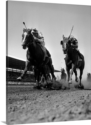 1960s Worm's-Eye View Of Horse Race With 2 Leaders Galloping Toward Camera