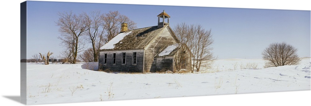 Abandoned schoolhouse on a snow-covered landscape, Friberg Township