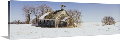 Abandoned schoolhouse on a snow-covered landscape, Friberg Township, Minnesota