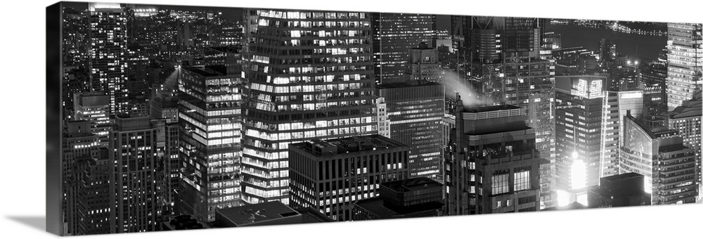 Panoramic photograph of lit up buildings in the "Big Apple."