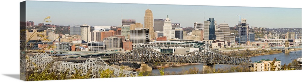 Panoramic photograph of skyline featuring iconic buildings such as the Carew Tower, PNC Tower, Cincinnati City Hall, and t...