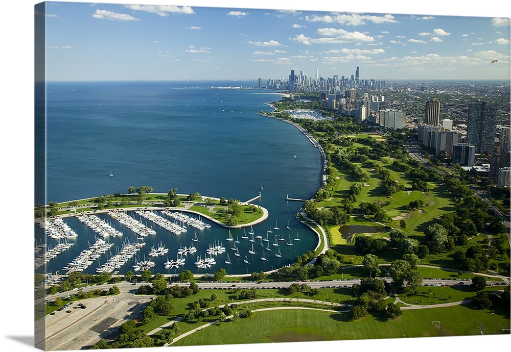 This high angle photograph is taken from a distance of Chicago and most of the lake shown to the left of the city.