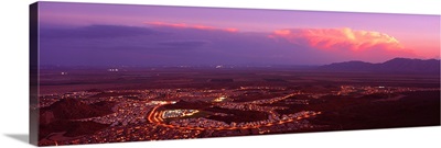 Aerial view of a city lit up at sunset, Phoenix, Maricopa County, Arizona,