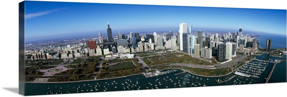 Panoramic photo canvas art of the Chicago cityscape with boats in the harbor seen from above.