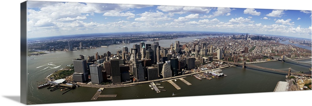Gigantic panoramic photo of Manhattan and surrounding areas in New York City, New York (NY) on a cloudy, sunny day.