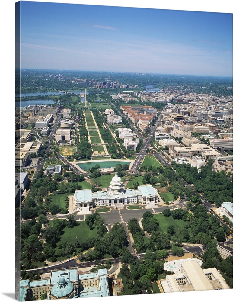 Many of the buildings and monuments in Washington DC are photographed on a bright sunny day from an aerial view.