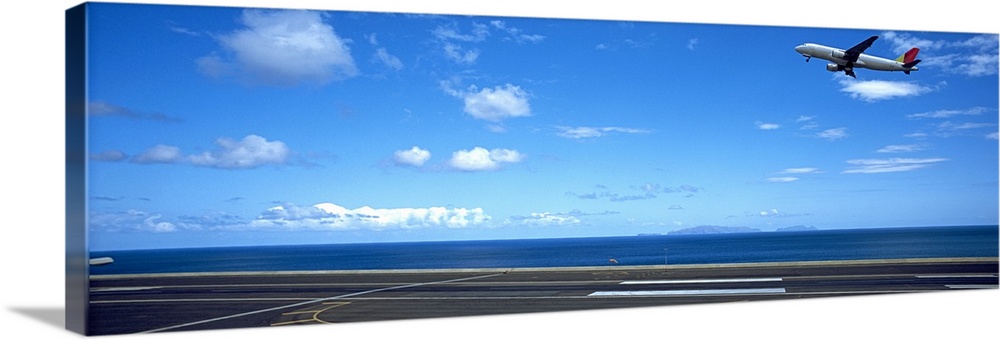 Airplane taking off from a runway, Funchal Airport, Funchal, Madeira, Portugal
