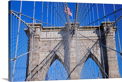 American flag flying over Brooklyn Bridge, New York City, New York
