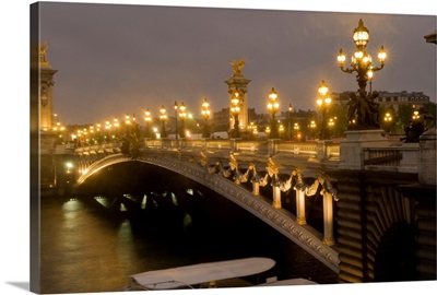 Arch bridge lit up at dusk, Pont Alexandre III, Seine River, Paris, France