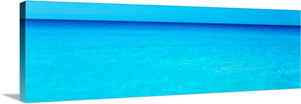 Panoramic photograph of crystal clear blue waters of the Atlantic Ocean that become more vibrant as they reach the horizon...