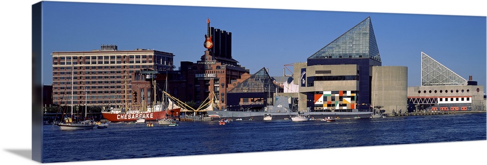 Buildings in Baltimore are photographed in wide angle view from across the waterfront.