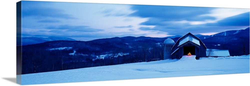 Barn in a snow covered field, Vermont, USA