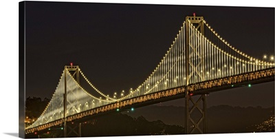 Bay Bridge suspension bridge lit up at night