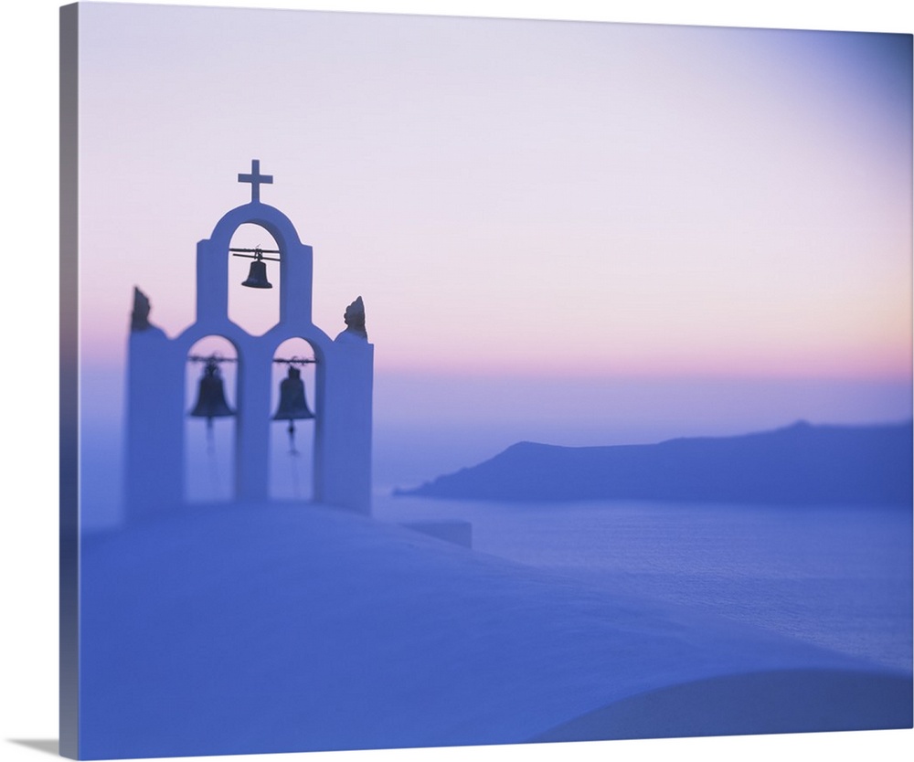 Bell tower of a church at sunset, Santorini, Greece