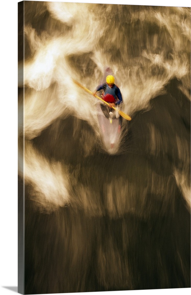 Portrait, overhead photograph on a big canvas of a lone kayaker on the Androscoggin River in New Hampshire.  The water app...