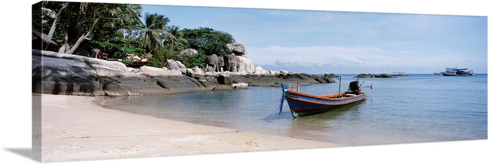 Boat moored on the beach