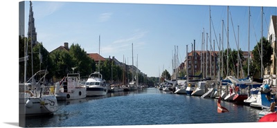 Boats moored along canal, Copenhagen, Denmark
