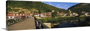 Bridge across a river with a city in the background Veliko Tarnovo Bulgaria image thumbnail