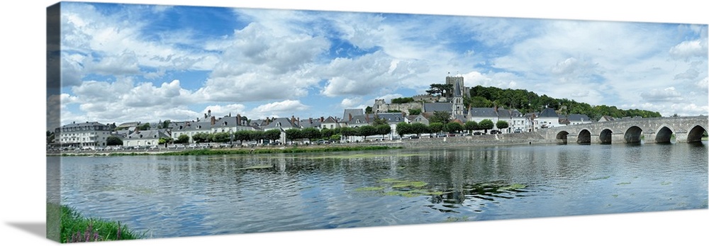 Bridge over river against cloudy sky, Cher, Montrichard, Loir-et-Cher, Centre-Val De Loire, France.