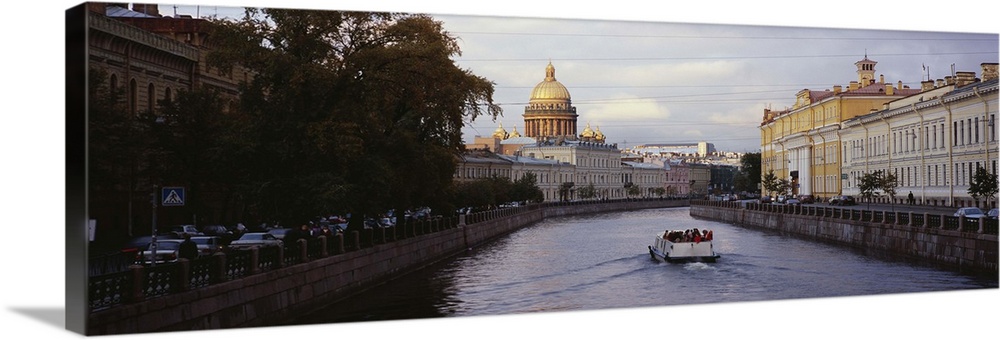 Buildings along a river, Moika River, St. Isaacs Cathedral, St. Petersburg, Russia