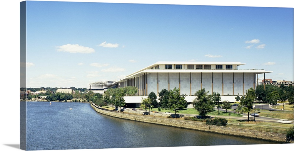 Buildings along a river, Potomac River, John F. Kennedy Center for the Performing Arts, Washington DC