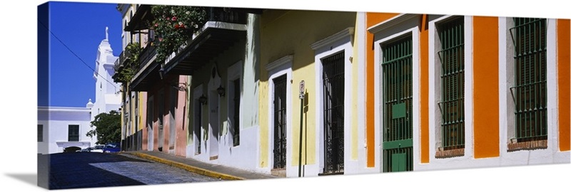 Buildings along a street, Calle Del Cristo, Old San Juan, Puerto Rico ...