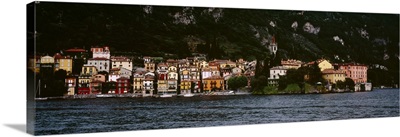 Buildings at the lakeside viewed from a ferry, Varenna, Lake Como, Lecco, Lombardy, Italy