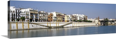 Buildings at the waterfront, Guadalquivir River, Seville, Seville Province, Andalusia, Spain