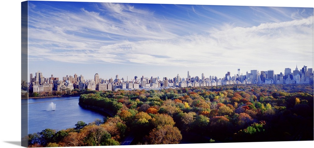 NYC skyline as seen with Central Park in the foreground during the fall.